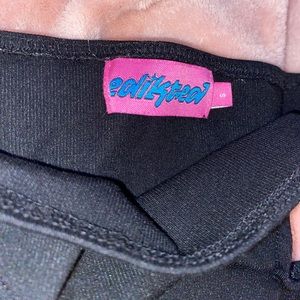 Black buckle mini skirt